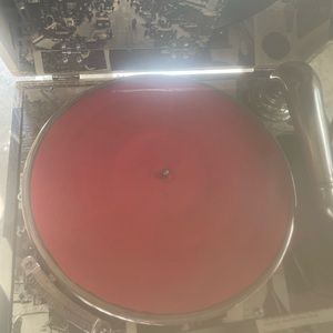 Updated record player with cool images. Gomes with 4 records